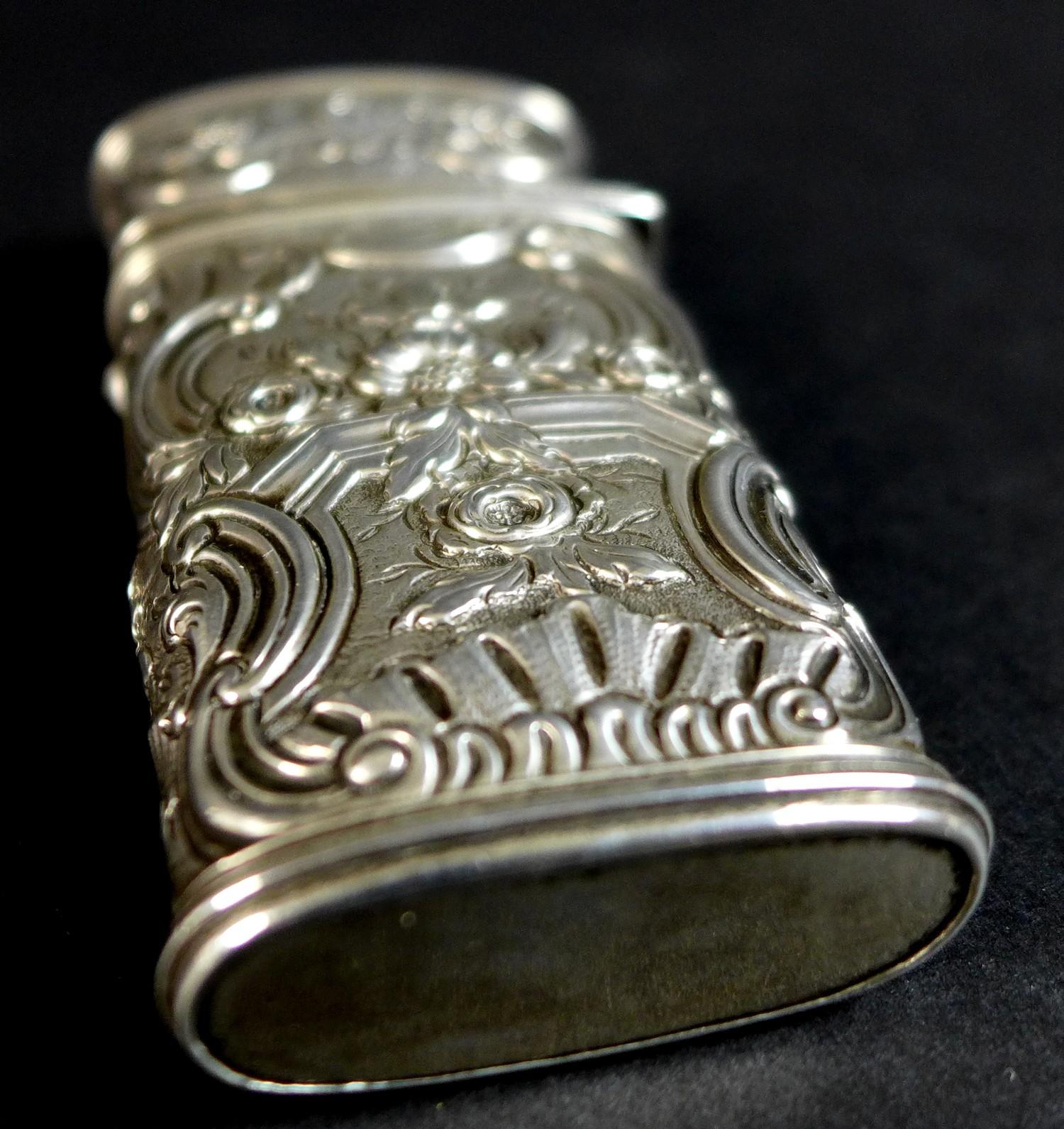 A late 18th or early 19th century silver coloured metal etui, of tapered rectangular form, chased - Image 2 of 11