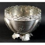 A Chinese Export silver punch bowl by Wang Hing & Co, circa 1900, the body decorated in relief