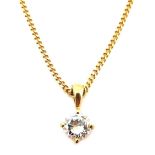 An 18ct yellow gold diamond solitaire pendant necklace, the 0.55ct, 5.5 by 3mm, brilliant cut