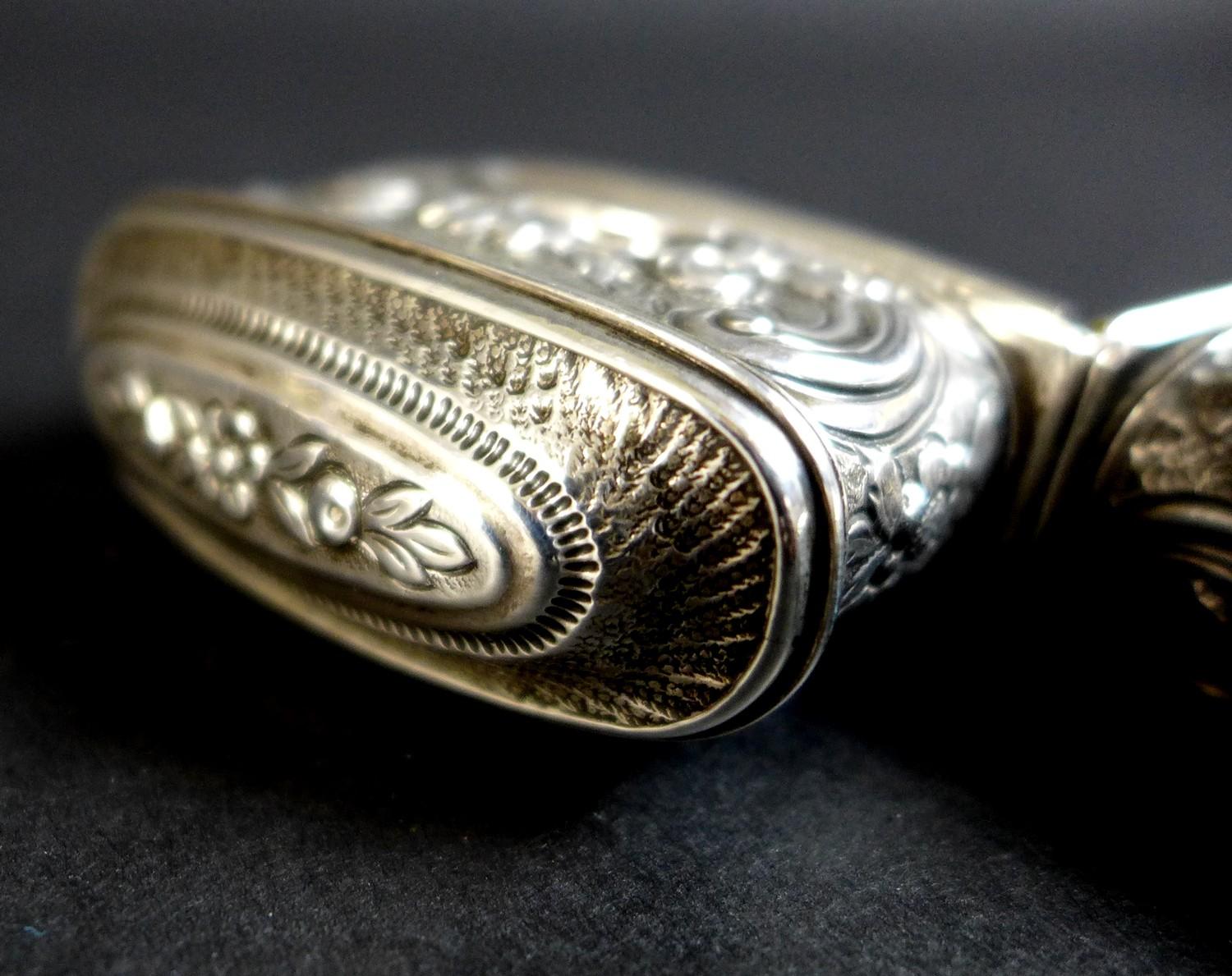 A late 18th or early 19th century silver coloured metal etui, of tapered rectangular form, chased - Image 4 of 11