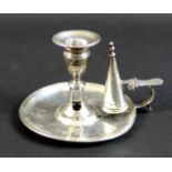 A George III silver chamber candlestick, with single scroll form handle, snuffing hood, rubbed