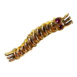 A WWII Caterpillar Club 9ct gold brooch, modelled as a silk worm, with inset ruby eyes, engraved