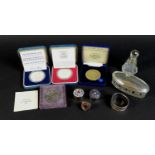 A collection of silver items and coins, including two dressing table items, a scent bottle with