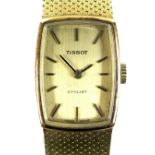 A Tissot Stylist 18ct gold cased lady's wristwatch, circa 1970s, the cushioned rectangular dial with