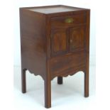 A George III mahogany night stand, with single drawer over cupboard and drawer-slide base, raised on