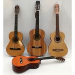 Four nylon strung classical style guitars, comprising a Sierra full size, a Constanta 3/4 size, an