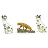 A pair of modern Italian ceramic figures, modelled as seated Dalmations, each 33 by 27 by 42cm high,