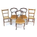 A set of three Victorian rosewood salon chairs, with carved and moulded frames, pink velvet seats,