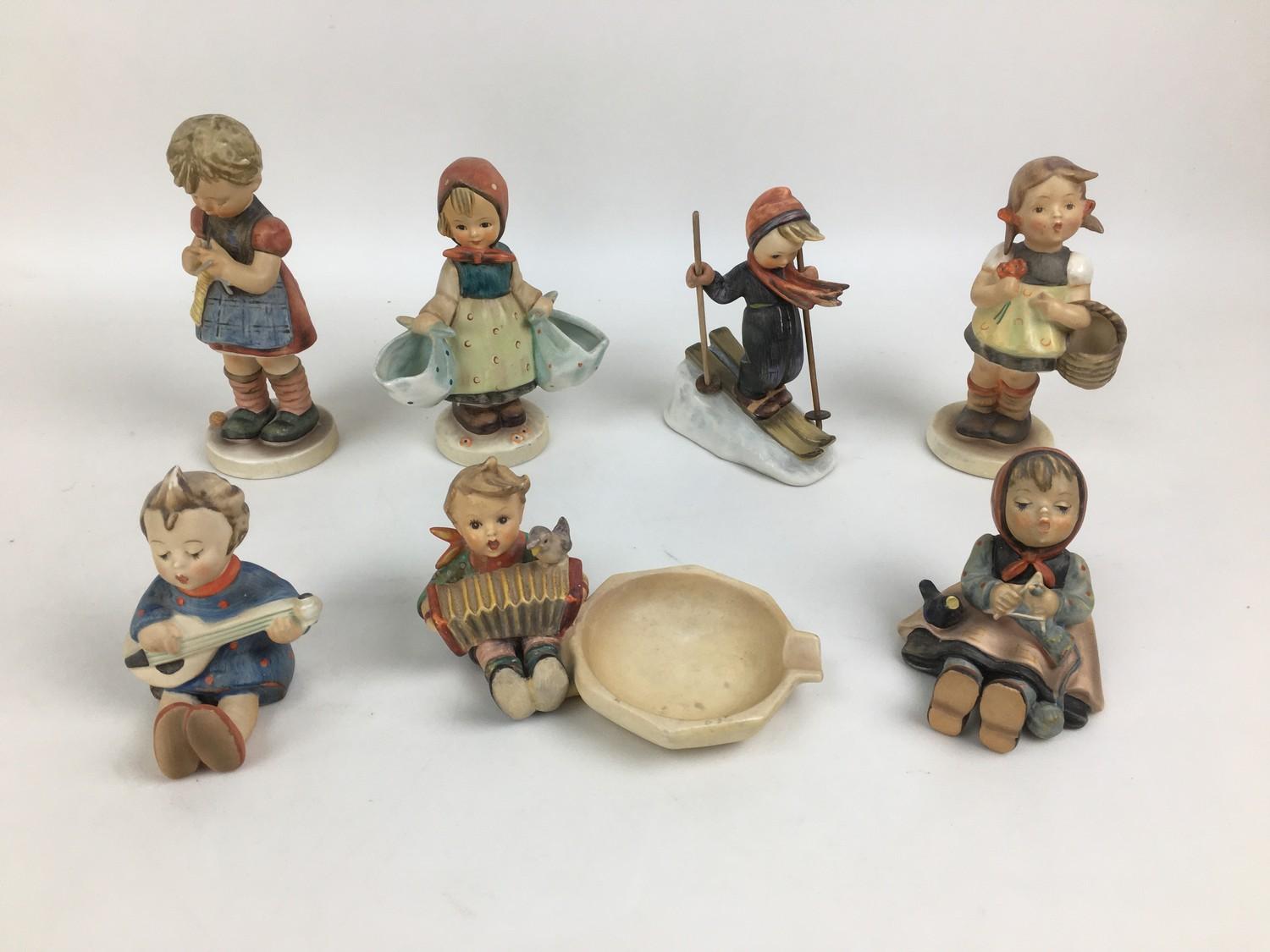 A collection of Royal Doulton and Hummel figurines, comprising, three Royal Doulton figurines, ' - Image 3 of 3
