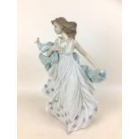 A Lladro porcelain figurine 'Summer Serenade', model no. 6193, designed by Regino Torrijos, with
