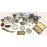 A group of silver plated and pewter wares, including a tea pot, coffee pot, eastern knife, pewter