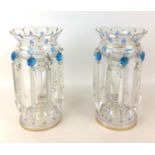 A pair of Victorian clear glass lustres, with blue enamelled decoration, a/f some replacement and