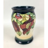 A Moorcroft ?Kapok Tree? pattern baluster vase by Nicola Slaney, with impressed marks and signed ?