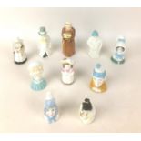 A collection of ten Royal Worcester porcelain snuffers, comprising Punch, 9cm high, Budge, 10.5cm