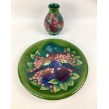 Two pieces Moorcroft pottery with finch and berry design by Sally Tuffin on green ground, comprising