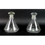A pair of 19th century clear glass ship's decanters, the large mushroom stoppers with cut