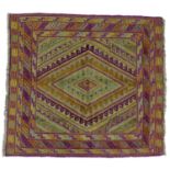 A Gazak rug, with orange, purple and light green diamond shaped decoration, latch hook edges, 125 by