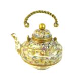 A fine Japanese Satsuma pottery teapot, Meiji period, with gilt metal swing handle, finely painted