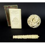 A group of three late 19th / early 20th century Chinese ivory items comprising a card case, the