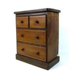 An Edwardian mahogany and line inlaid miniature chest of drawers, two short over two long with