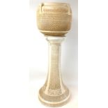 A Victorian Bretby cream coloured jardiniere on stand, with impressed marks to base of both