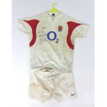 A 2005 England Rugby Team shirt, signed in black marker