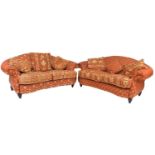 A pair of modern two seater sofas, with red and cream upholstery, each 186 by 100 by 92cm high. (2)