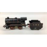 A vintage Hornby O gauge loco 0-4-0 '2290', with tender and key, in play worn condition, without