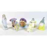 A group of decorative ceramics including two Royal Worcester candle snuffers, Mr Caudle and French