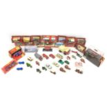 A collection of Corgi, Dinky and sixteen boxed Matchbox models of Yesteryear die cast models,
