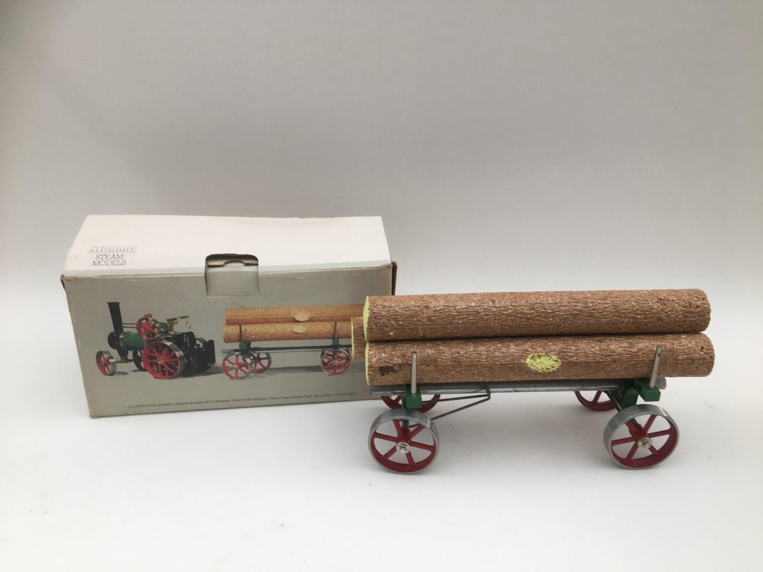 A Mamod steam engine, without its box and two Mamod trailers, an Open Wagon and a logging wagon, - Image 5 of 5