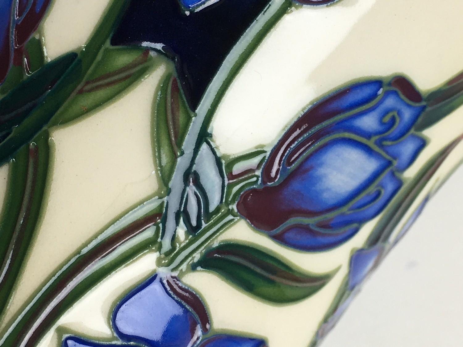 Three Moorcroft pottery vases, comprising two vases of tapering form, one in violet pattern with - Image 5 of 7