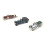 Three Franklin Mint die-cast model cars, comprising a 1907 Rolls Royce Silver Ghost, a 1930