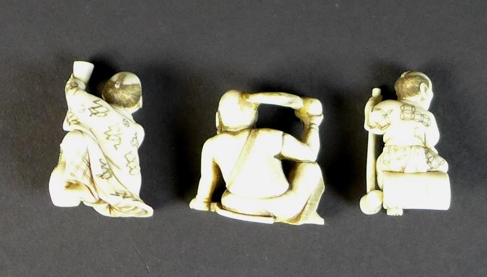 A group of Japanese Meiji period ivory figures comprising three netsuke, one of a gentleman with a - Image 2 of 10