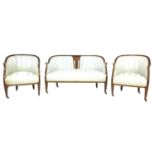 An Edwardian mahogany and inlaid part salon suite, upholstered in pale blue striped satin fabric,