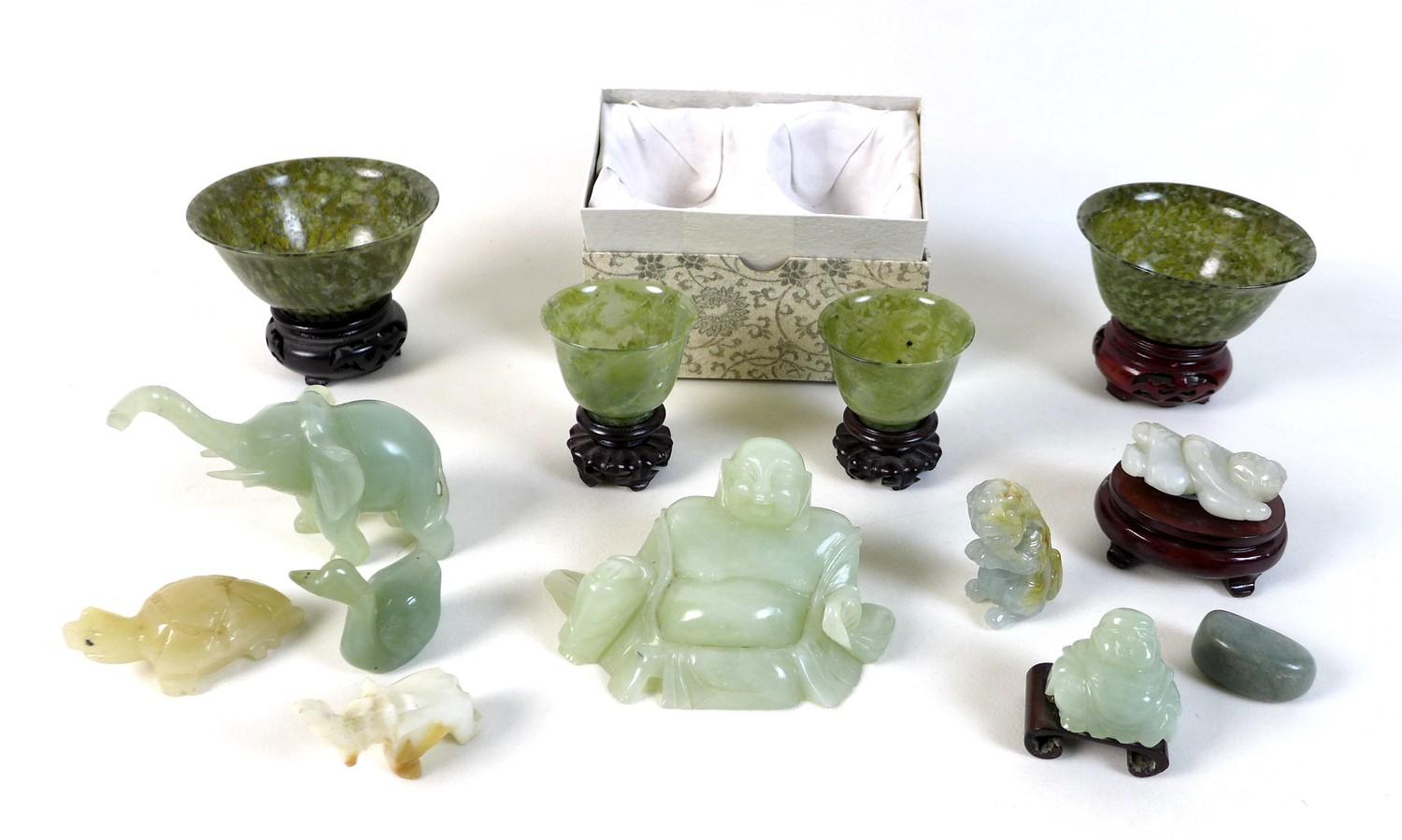 A collection of modern jade and hardstone ornaments, including two pairs of cups, and various carved