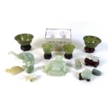 A collection of modern jade and hardstone ornaments, including two pairs of cups, and various carved