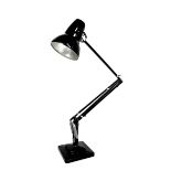A vintage black Anglepoise desk lamp, circa 1940, cast marks 'The Anglepoise, Pat. in UK and