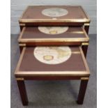 A nest of three brass bound mahogany tables, of campaign design, on block supports,