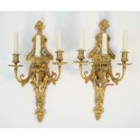 A pair of Empire style ormolu three light wall appliques, 20th century,