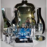 A group of three mirrored vases, 50cm high and a group of four 20th century chromed pots,