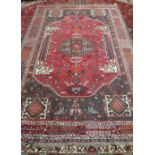 A Shiraz rug, Persian, 250cm x 166cm.