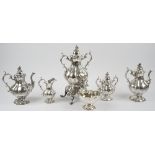 An American plated six piece tea and coffee set, comprising; a twin handled lidded urn,