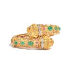 An emerald, ruby and diamond hinged bangle by Ilias Lalaounis,