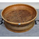 A mid-20th century rattan basket weave low table.
