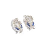 A pair of sapphire and diamond earclips, each in an openwork curved and spray design,