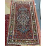 A Bidjar rug, Persian, the dark indigo herate field with ivory herate medallion with indigo ends,