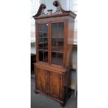 A George III style bookcase cabinet,