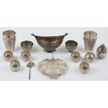 A group of Persian and Asian wares, comprising; a twin handled boat shaped dish, a leaf shaped dish,
