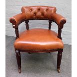 A 19th century tub back office chair, with studded tan leather upholstery,